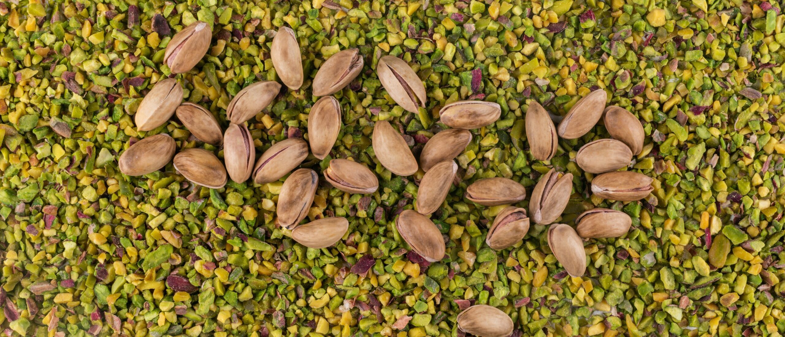 top-view-pistachios-crushed-granulated-texture top-view-pistachios-crushed-granulated-texture